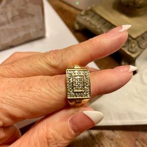 Solid 10k yellow gold and genuine e diamond men’s ring.